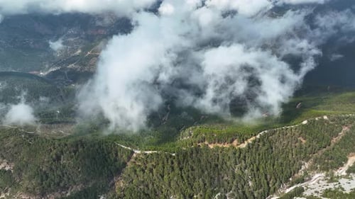 Cloudy landscape high in the mountains aerial view 4 K