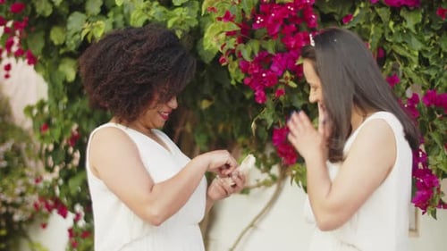 Woman Proposes to her Partner in Garden
