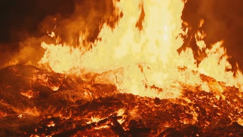 the Real Flame of a Huge Fire the Camera Approaches Very Close To the Center of the Fire