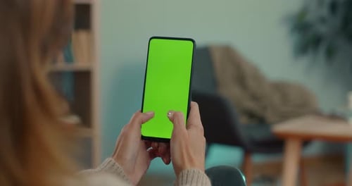 Woman Texting on Chroma Key Screen of Smartphone