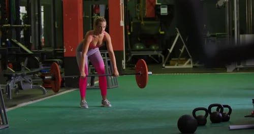 Woman exercising in a gym