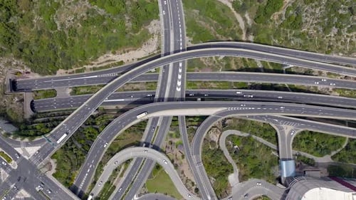 Massive multi level highway interchange with traffic on all routes, Aerial view.