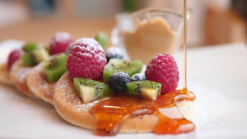 Pancakes with Fruit and Syrup Drizzle