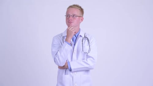 Young Doctor Thinking Deeply in Lab Coat