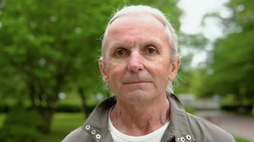 Close Up of Mature Man Outdoors in a Park