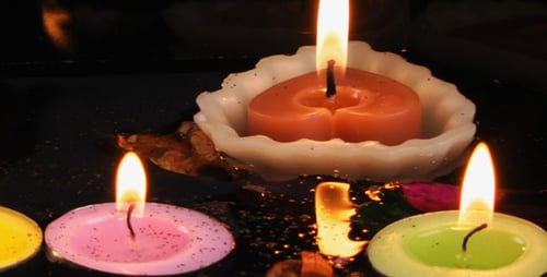 Candles and Dry Leaves on the Water 2