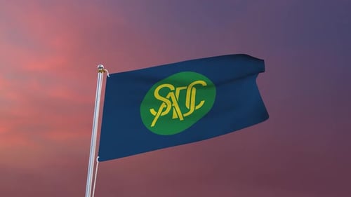 Waving Flag with Custom Logo Against Sunset Sky