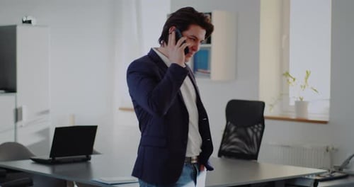 Business in Office Answering Phone Call