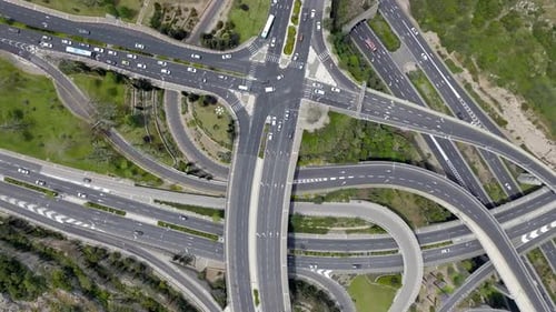 Timelapse of a Massive multi level highway interchange with traffic on all routes, Aerial view.