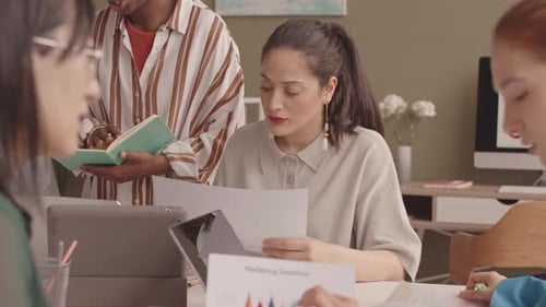 Female Team Working Together in Office