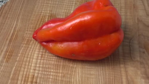 Close Up Red Bell Pepper on Cutting Board
