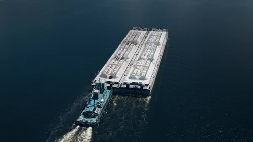 Aerial River Tugboat Barge Transports Cargo Goods Closeup