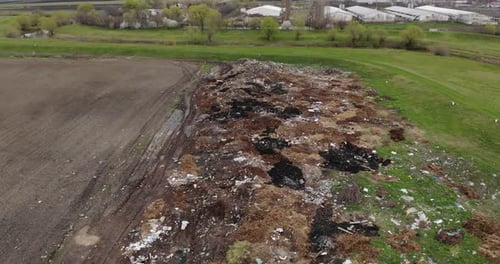 Polluted Hill Near Meadows By The River