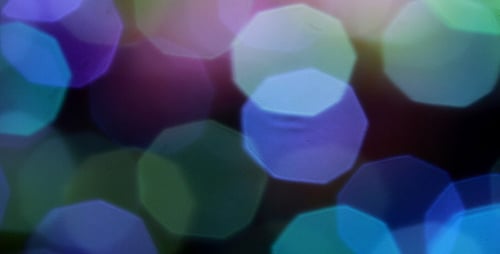 Blurred Octagonal Light Orbs in Abstract Background