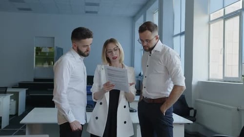 Business Professionals Collaborating in Modern Office Space