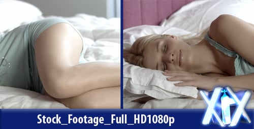 Young Woman Sleeping Peacefully in Bed