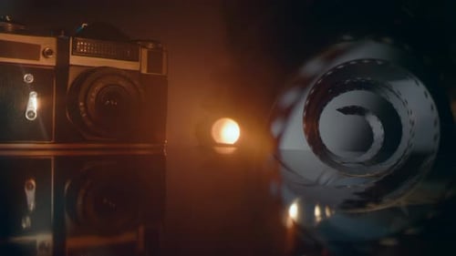 Retro Camera and Film Roll Still Life