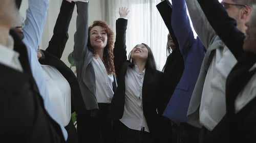Multiracial business people stacking hands together in modern office - Teamwork concept