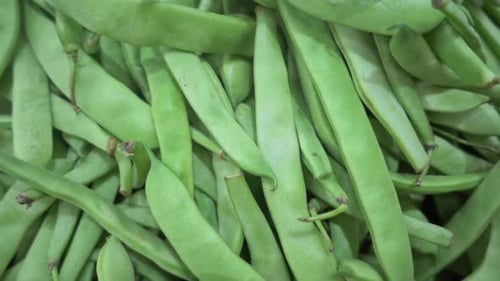 Pile Of Fresh Green Beans On The Market Stand