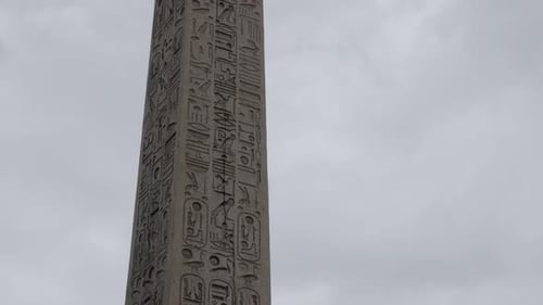 Famous Luxor Obelisk on Concorde square in French capital Paris slow tilt 4K 2160p UltraHD footage