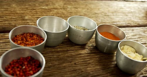 Small Bowls Filled with Spices and Ingredients