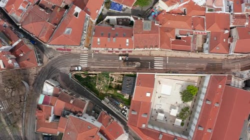 Aerial Birds Eye Overhead Top Down View of Low Traffic in Narrow Streets of Old Town Center