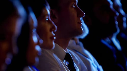 Young Caucasian businessman attending business seminar in auditorium 4k