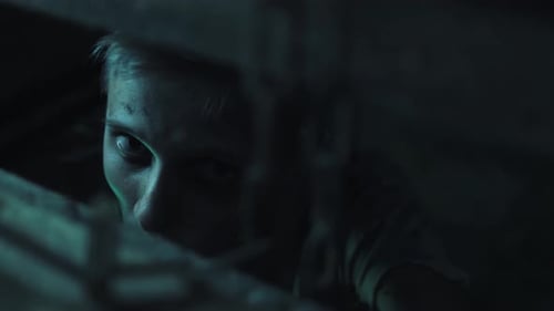 Scary Person Peering Out From Darkness