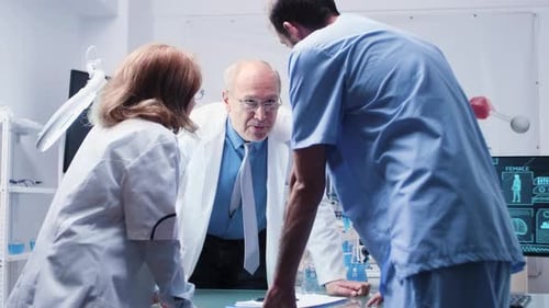 Medical Team Discussing Research in Bright Laboratory
