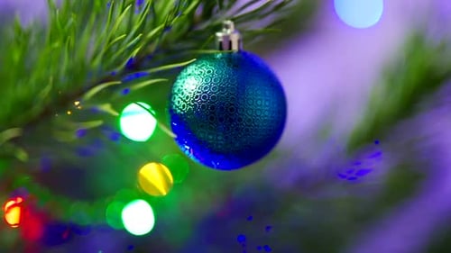 Christmas tree ornament. Close up of decorative toy ball on Christmas tree branch