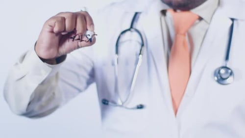 Doctor Writes Word False with Marker