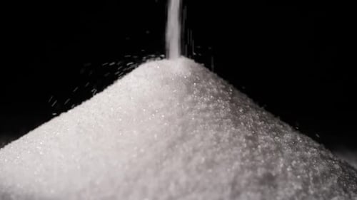Chefs pour salt together to check the quantity