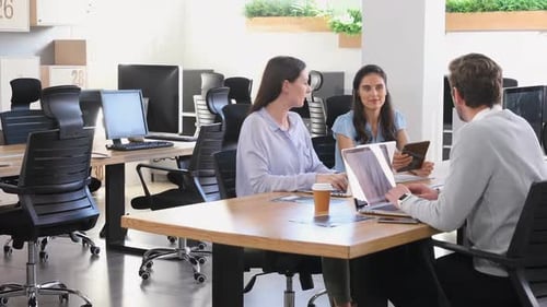 Team Collaboration Meeting in Bright Modern Office