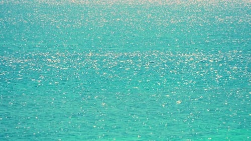 Turquoise Ocean Water Shimmers in the Sunlight