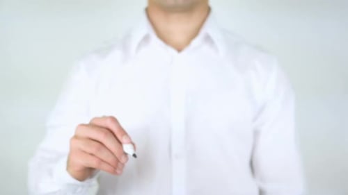 Man Drawing Euro Symbol on Transparent Surface