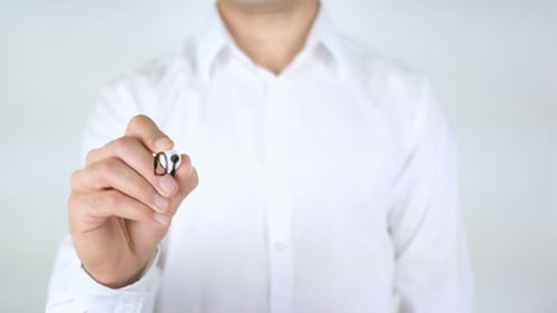 Man Writes Data Structure on Clear Surface