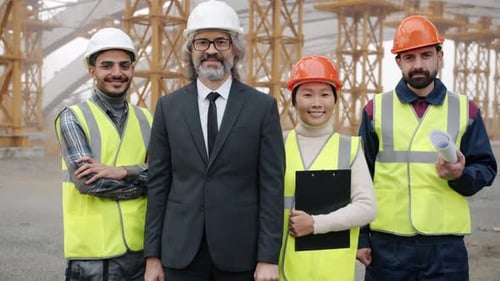Engineers Smiling on Construction Site