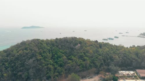 Bird Eye View Green Forestry Hills Lit By Tropical Sun