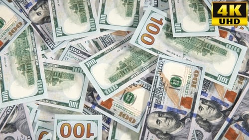 Animated Falling US Dollar Bills Pile Up