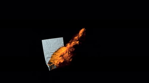 Burning paper with dark background.