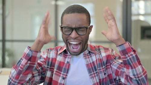 Man Screaming in Frustration and Anger Close Up