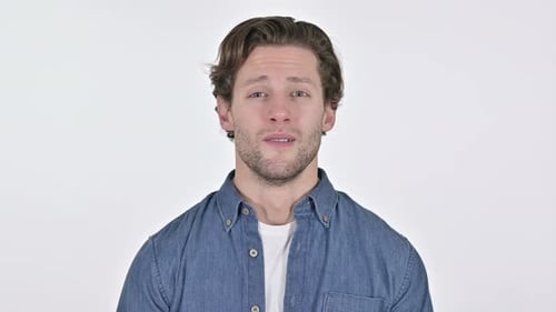 Smiling Man Speaking to Camera on White Background