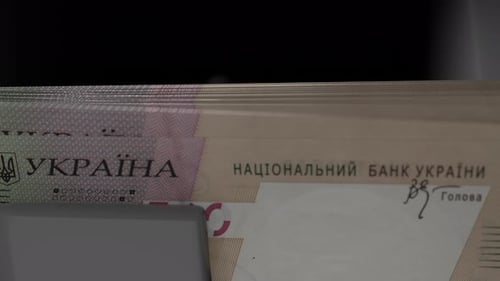 500 Ukrainian hryvnia in cash dispenser. Withdrawal of cash from an ATM.