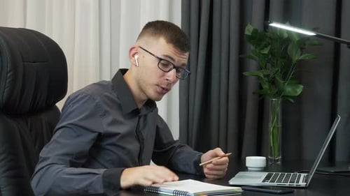 Successful businessman is making distance online webcam video call conference with colleagues
