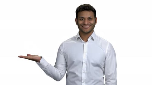 Smiling Man Presenting with Hands, White Background