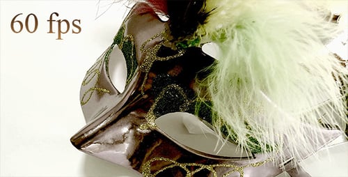 Ornate Masquerade Mask with Feathers and Glitter