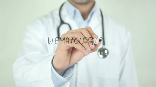 Medical Professional Writes Word Hematologist