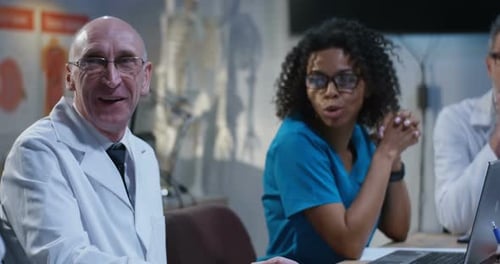 Medical Professionals Collaborating During Office Meeting