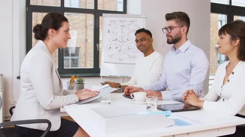Diverse Business Team Meeting in Bright Office
