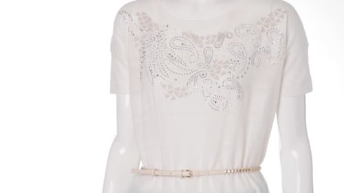 Mannequin in Stylish Outfit Displayed Against White Backdrop